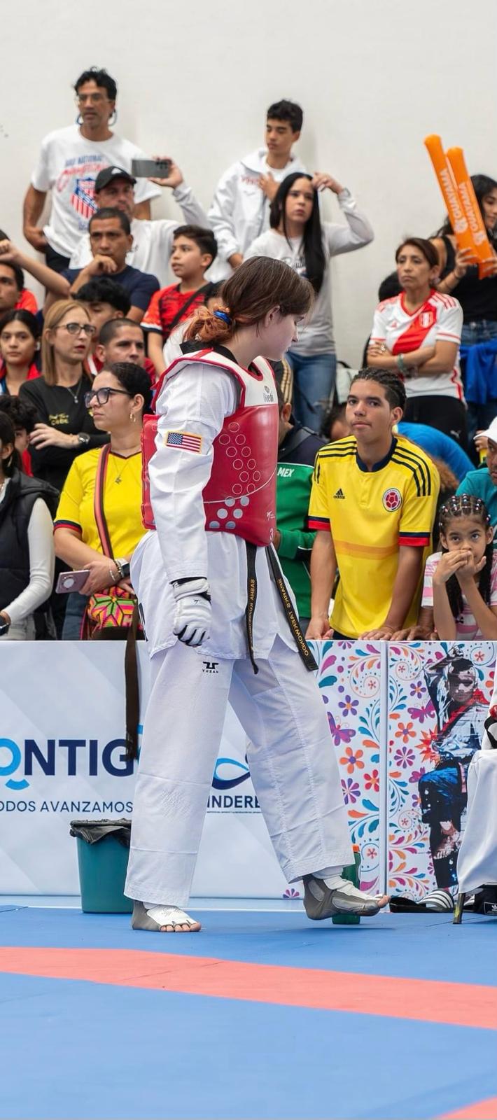 Sasha Kuzmenkova in competition gear at a tournament